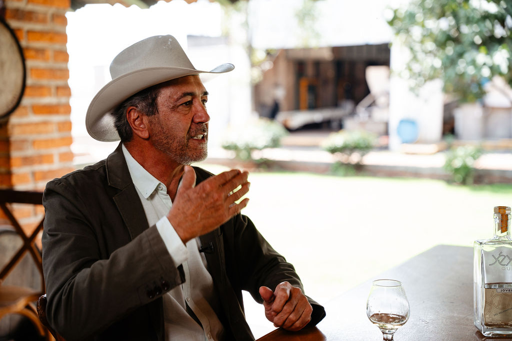 Sergio Vivanco in conversation at a table in Mexico