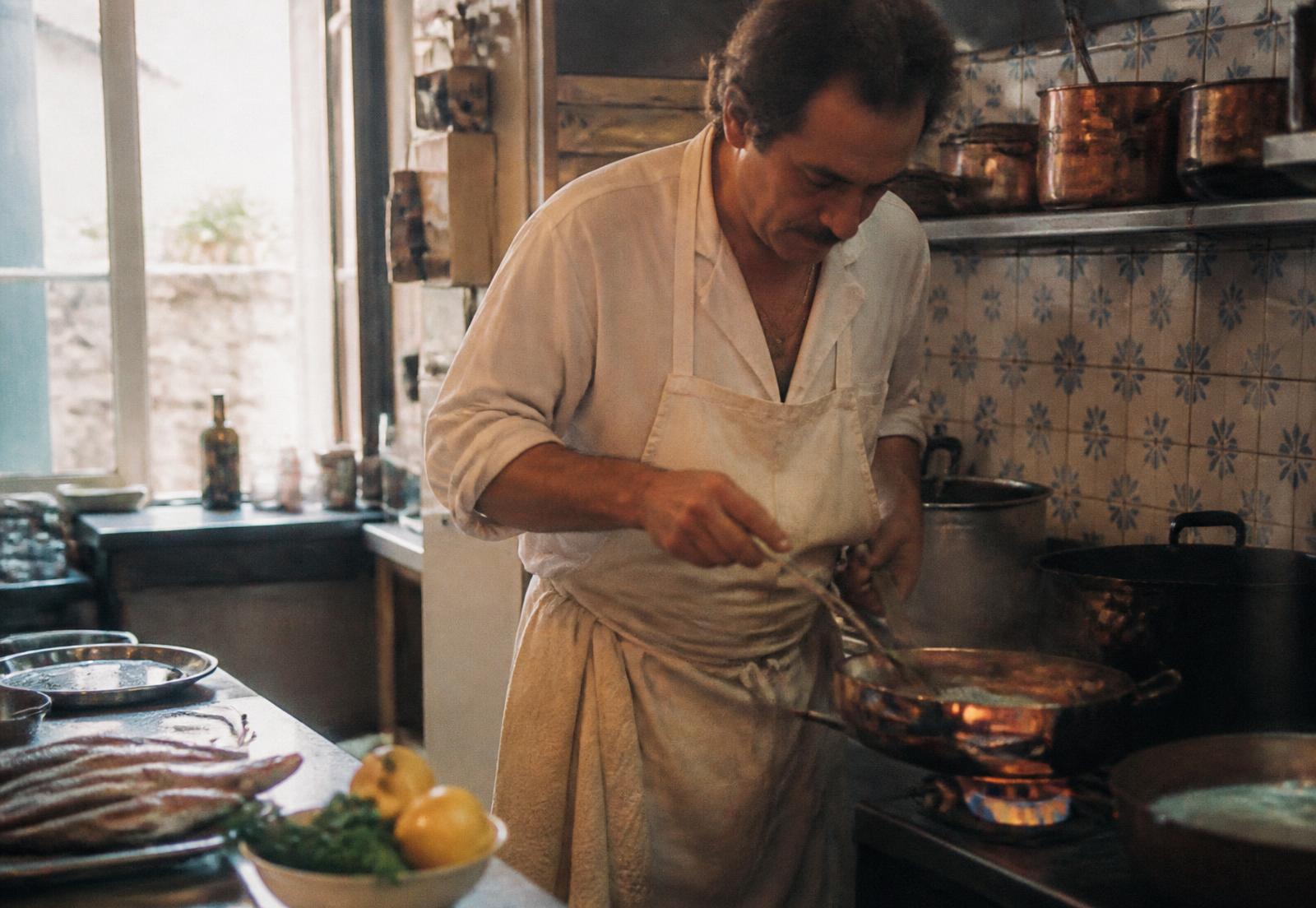 Chef Étienne Moreau working at the stove